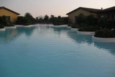 Отель Joia Hotel & Luxury Apartments в городе Брузапорто, Италия