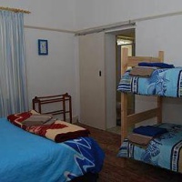 Отель Sunbird Accommodation & Backpackers в городе Оудтшурн, Южная Африка