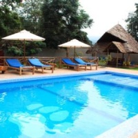 Отель Honey Badger Lodge в городе Моши, Танзания