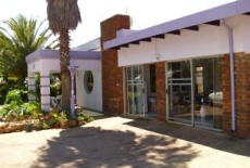 Отель Purple Palms Traveller Lodge and Backpacker в городе Кемптон Парк, Южная Африка