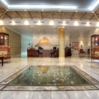 Отель Mitsis Galini Wellness Spa & Resort в городе Камена Вурла, Греция
