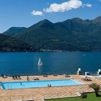 Отель Golfo Gabella Lake Resort в городе Макканьо, Италия