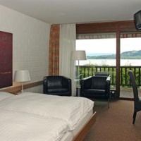 Отель Hotel Bad Muntelier Am See в городе Мунтелье, Швейцария