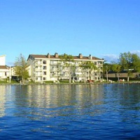 Отель Location Tourisme Estrie - Oberge du Village в городе Мейгог, Канада