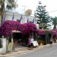 Отель Harry's Bar & Apartments в городе Ахарави, Греция